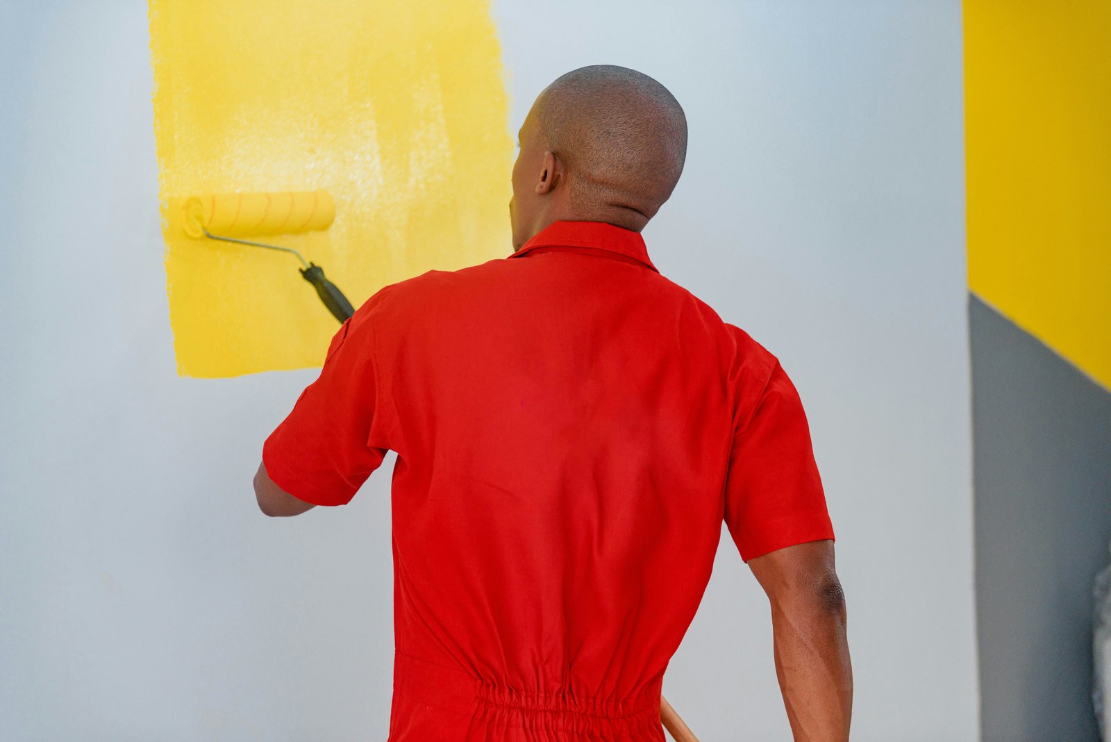 Professional painter preparing a wall